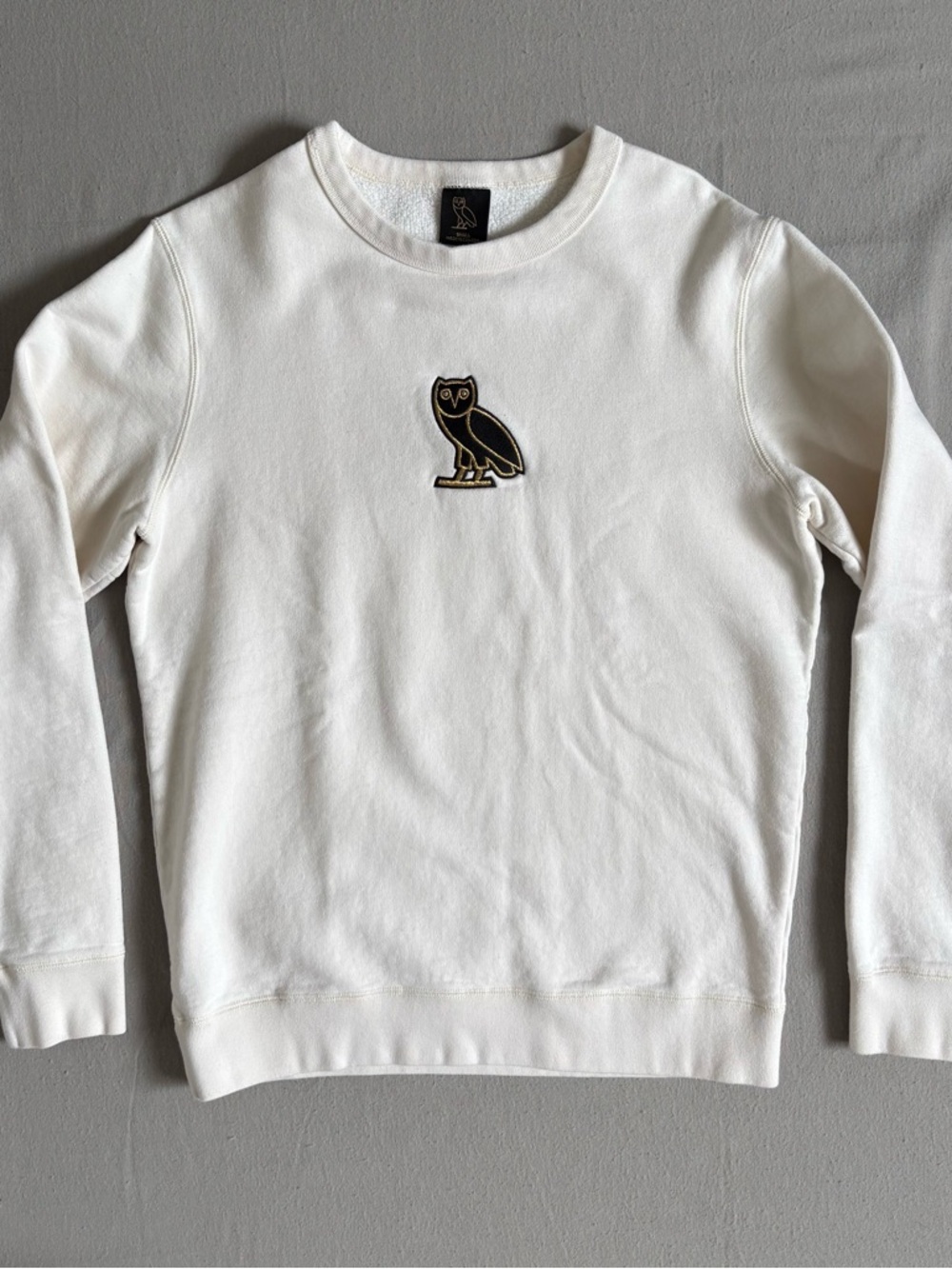 OVO White Crewneck Sweatshirt with Black & Gold Owl Patch